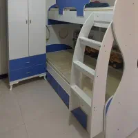 تخت دوطبقه با کمد