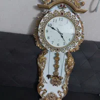 یک عدد ساعت دیواری لنگری سالم در حد نو بسیار تمیز