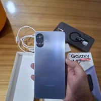 گوشی سامسونگ A07رنگ بنفش یاسی 128رم 6 اک اک