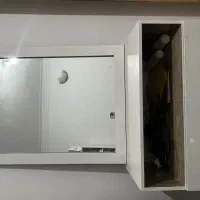 یک عدداینه به همراه کمد سه کشم
