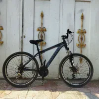 دوچرخه سایز 26 دنده ای در ح  نو ترمز دیسکی