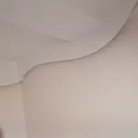 نقاشی ساختمان با دستگاه ایرلس و سنباده برقی