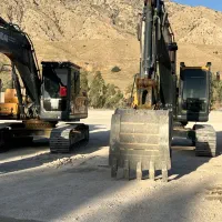 راننده بیل مکانیکی هستم