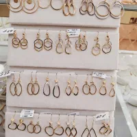 گوشواره های حلقه ای ‌.آویز در طلای نغمه