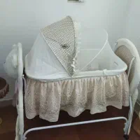 حراج گهواره موزیکال باتری خور مناسب سیسمونی