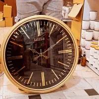 ساعت های دیواری لوتوس طلایی اک