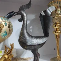 خروس نقره کوب علامت