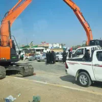 راننده بیل مکانیکی ام