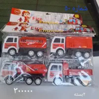 ماشین و تفنگ و عروسک‌های اسباب بارب