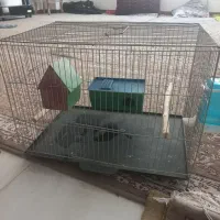 قفس پرنده با لونه