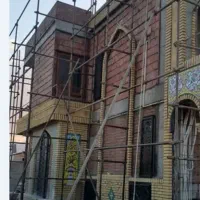 اجرای نمای ساختمان سفال کاری و سنگ کاری