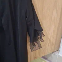 مانتو مشکی دکمه‌دار