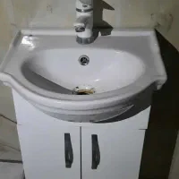 روشویی و شیر آب