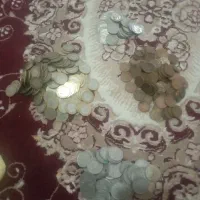 مقداری پول سکه از پهلوی اول و دوم تاجمهوری اسلامی