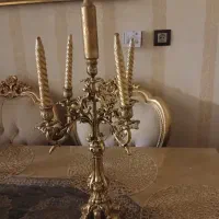 بی نظیر .تابلو.شمعدان برنز.اطو پرسی و کیف چرم