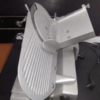 ترازو و کالباس بر و بارکدخوان