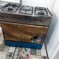 گاز پنج شلعه فقط شیشه جلو نداره سالم