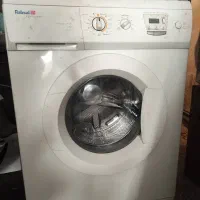 لباس شویی ابسال