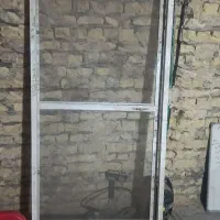 دو عدد درب آلومینیومی توری همراه با چارچوب
