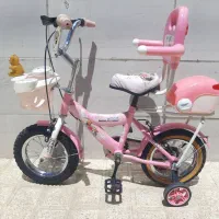 دوچرخه ۱۲ تمیز و سالم همه چی صحیحو سالم صورتی