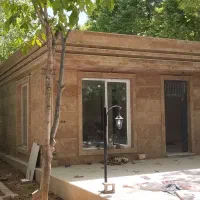 اجرای سنگ نما ساختمان و باغ ویلا و نصب نرده سنگی