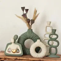دکوری تندیس زوج نشسته ( گالری صابری)