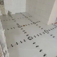 نصب کاشی سرامیک ما بین کابینت به صورت چسبی