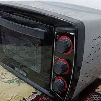 توستر کیک پز و پیتزا پز