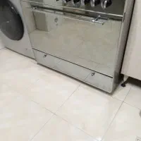 گاز التون ۵شعله فر دار ویک کمد وجا کتابی