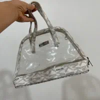 تعدادی کیف|کیف، کفش، کمربند|شیراز, شیخ علی چوپان|دیوار