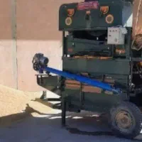 کارگر برای دستگاه بوجاری