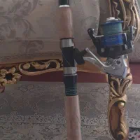 2 عدد چوب و چرخ ماهیگیری نو