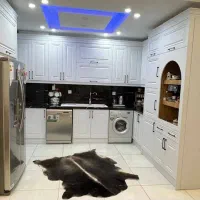 اجرای دکوراسیون داخلی کاغذ دیواری، پارکت و کابینت