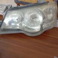 دو عدد چراغ جلو پراید۱۳۲ و تو عدد چراغ پلیسی