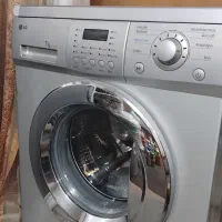 ماشین لباسشویی آکبند نو نو  ال جی نقره ایی
