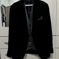 یک دست کت و شلوار