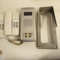 پنل آیفون 4 واحدی کوماکس و باران گیر و 2 گوشی صوتی