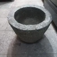 یانه سنگی .هاون سنگی