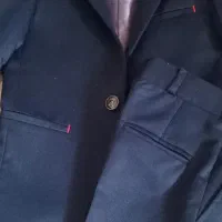 تعدادی کت شلوار و کت پسرانه