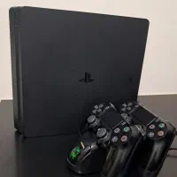 ps4 اسلیم دو دسته به همراه پایه شارژر دابی