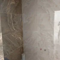 کاشی کاری چسبی ودوغابی
