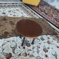 میز شیشه ای وسط مبل