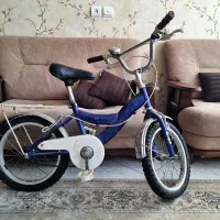دوچرخه شماره 16 با چرخ کمکی و پشتی صندلی