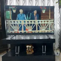 میز تلویزیون همراه با دکور