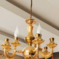 یک عدد لوستر برنج آب طلا‌ (کیلویی نمیفروشم)