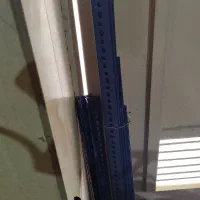 نبشی قفسه انباری آبی رنگ