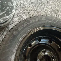 یک عدد لاستیک و رینگ و آچر سورن