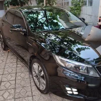 اپتیما 2015  فول مشکی 2400cc  در حد بدون توضیح