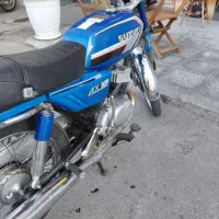 سوزوکی ax100