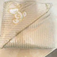 پتوی دور پیچ نوزاد نو هستش کرم رنگ هست